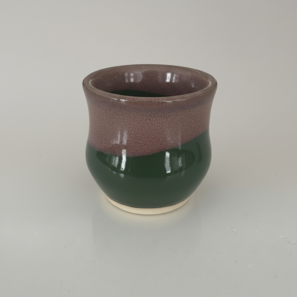 Two-tone ceramic cup side angle view