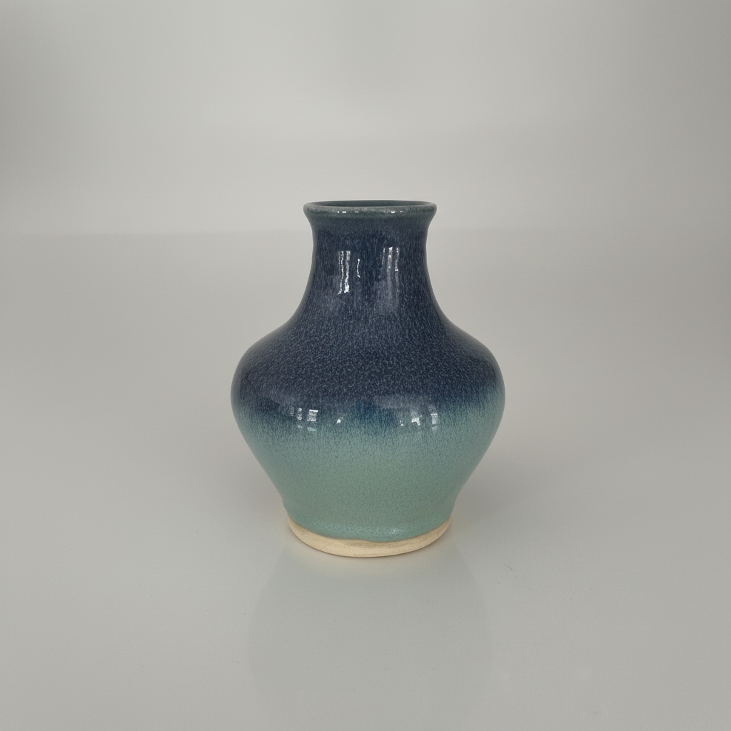 Side angle view of blue ceramic vase