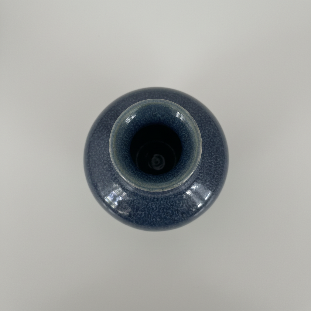 Top-down view of blue ceramic vase